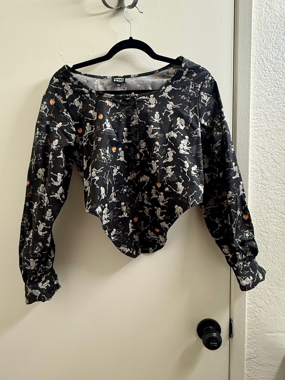 Cropped Black Button-Front Blouse with Skeleton Print